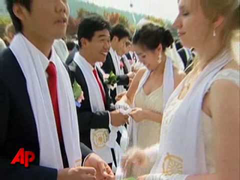Tens of Thousands in Unification Mass Wedding